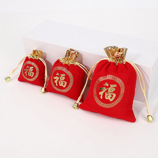 ถุงกำมะหยี่ สีแดง ขอบสีทอง เชือกหูรูด พิมพ์ลายอักษรจีน “พร”